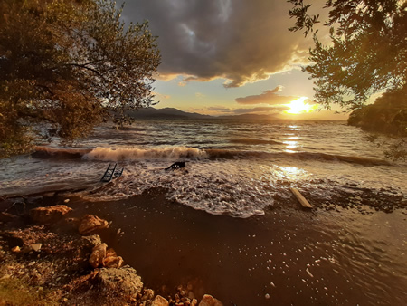 By windy days the waves bring again the pollution and the waste to the beaches